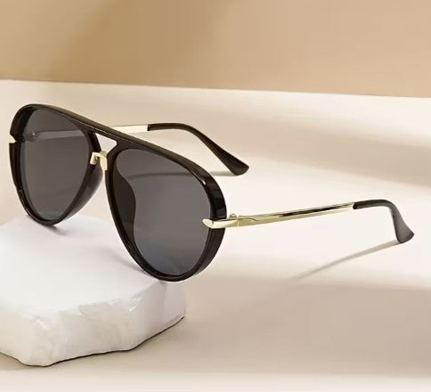 Lentes de sol mujer negro y dorado