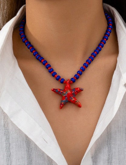 Collar cerámica forma estrella rojo