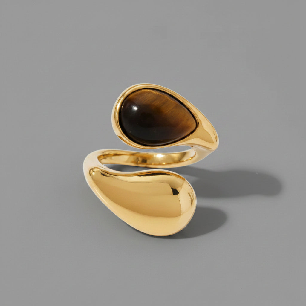 Anillo abierto con ojo de tigre piedra dorada