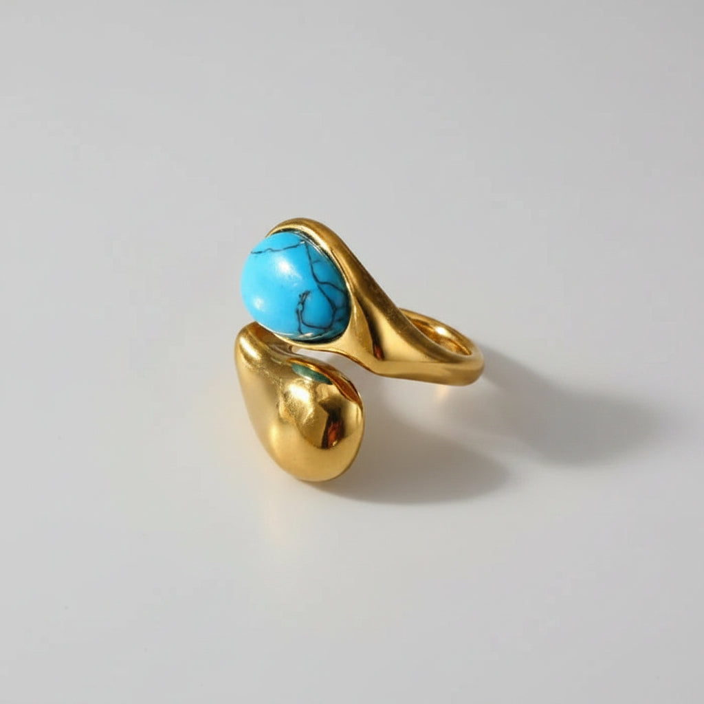 Anillo abierto con ojo de tigre piedra calipso