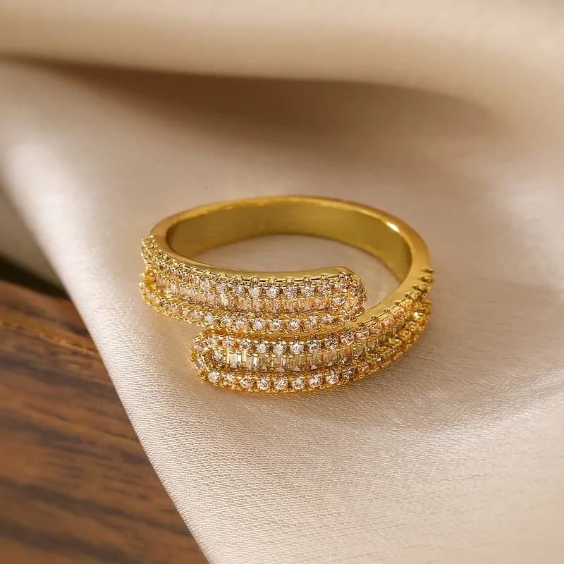 Anillo abierto doble cintillo circones dorado