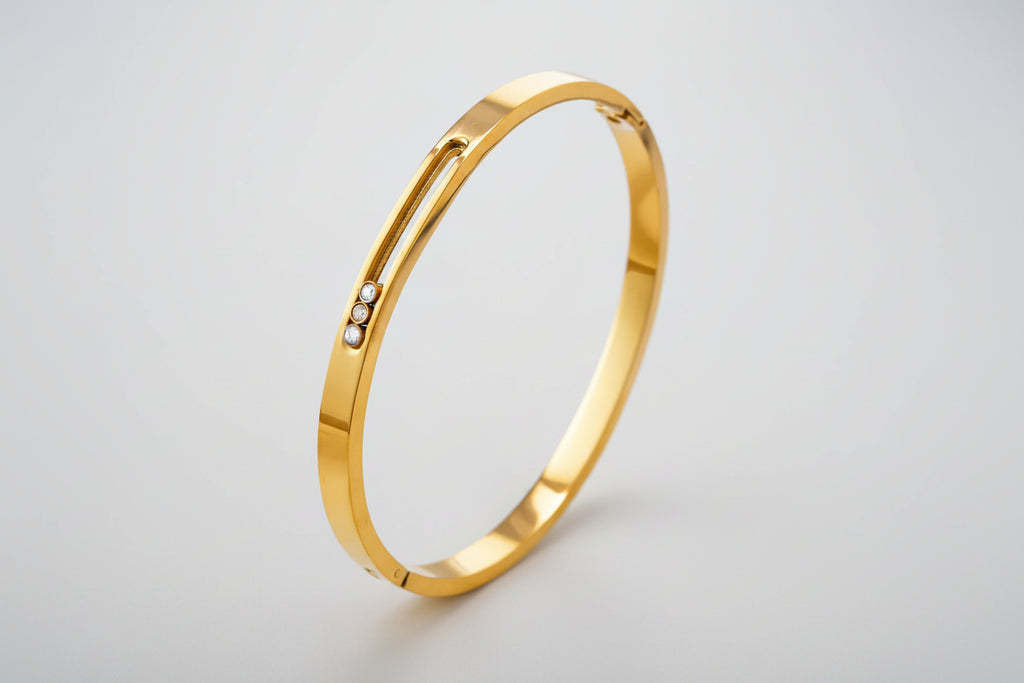 Pulsera dorada con 3 circones