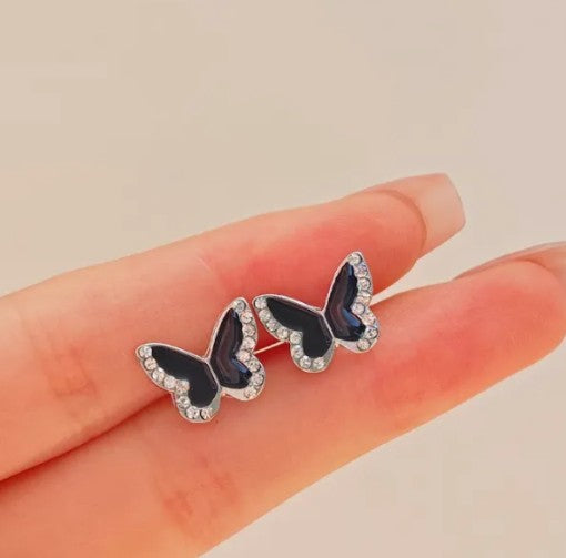 Aro pequeños mariposa negra