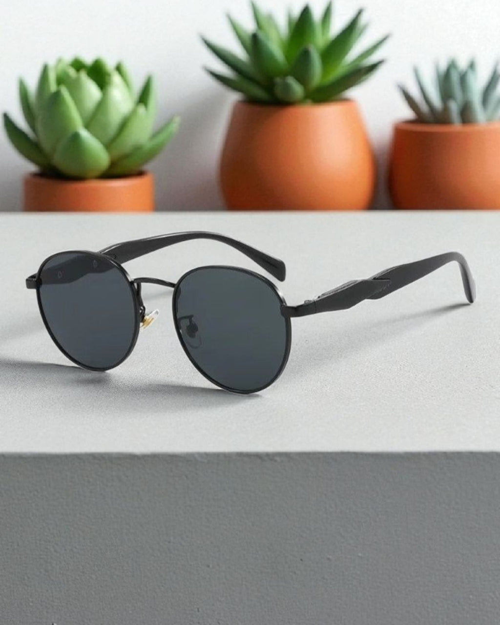 Lentes de sol redondo color gris marco negro